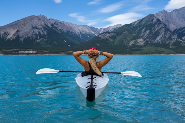 Woman enjoying nature after acupuncture treatment to balance hormones